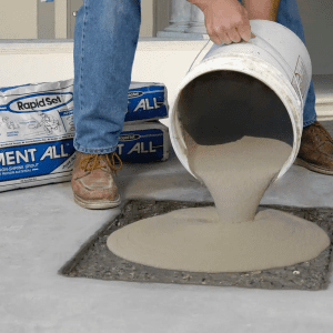 Rapid Set Cement All being poured into hole